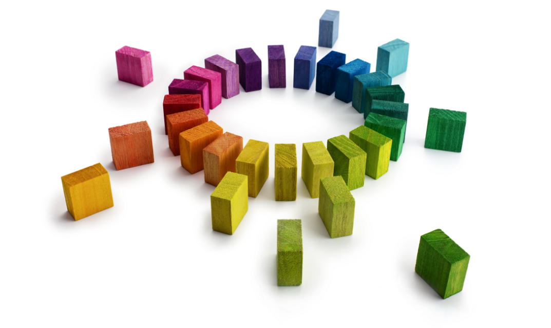 colored blocks forming into a circle representing coming together